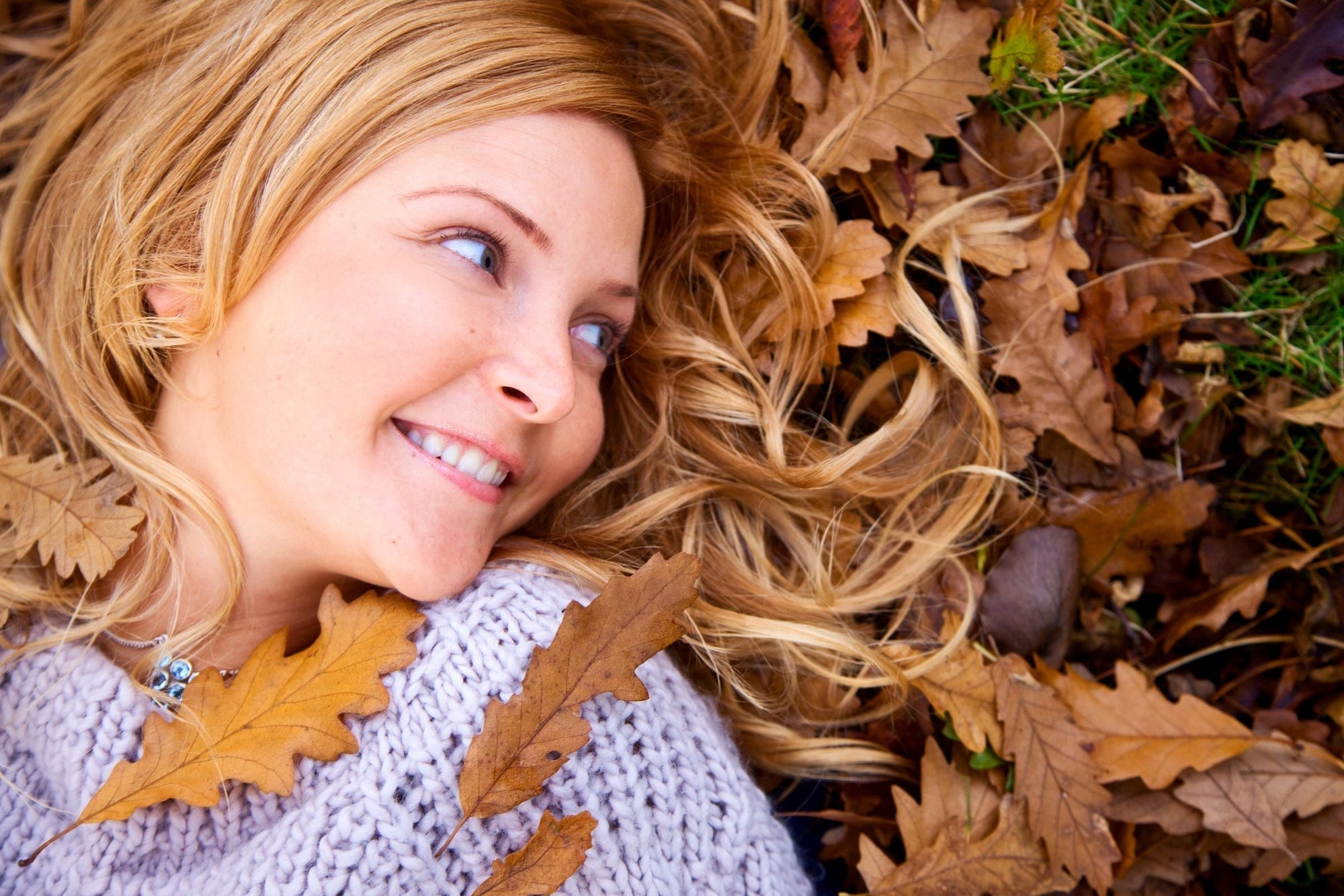 A woman with healthy hair in Autumn or Fall