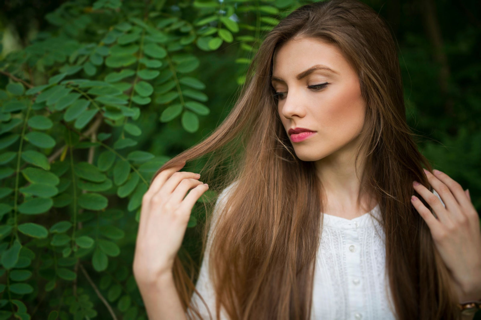 Woman with naturally beautiful hair who has used Holistic hair products.