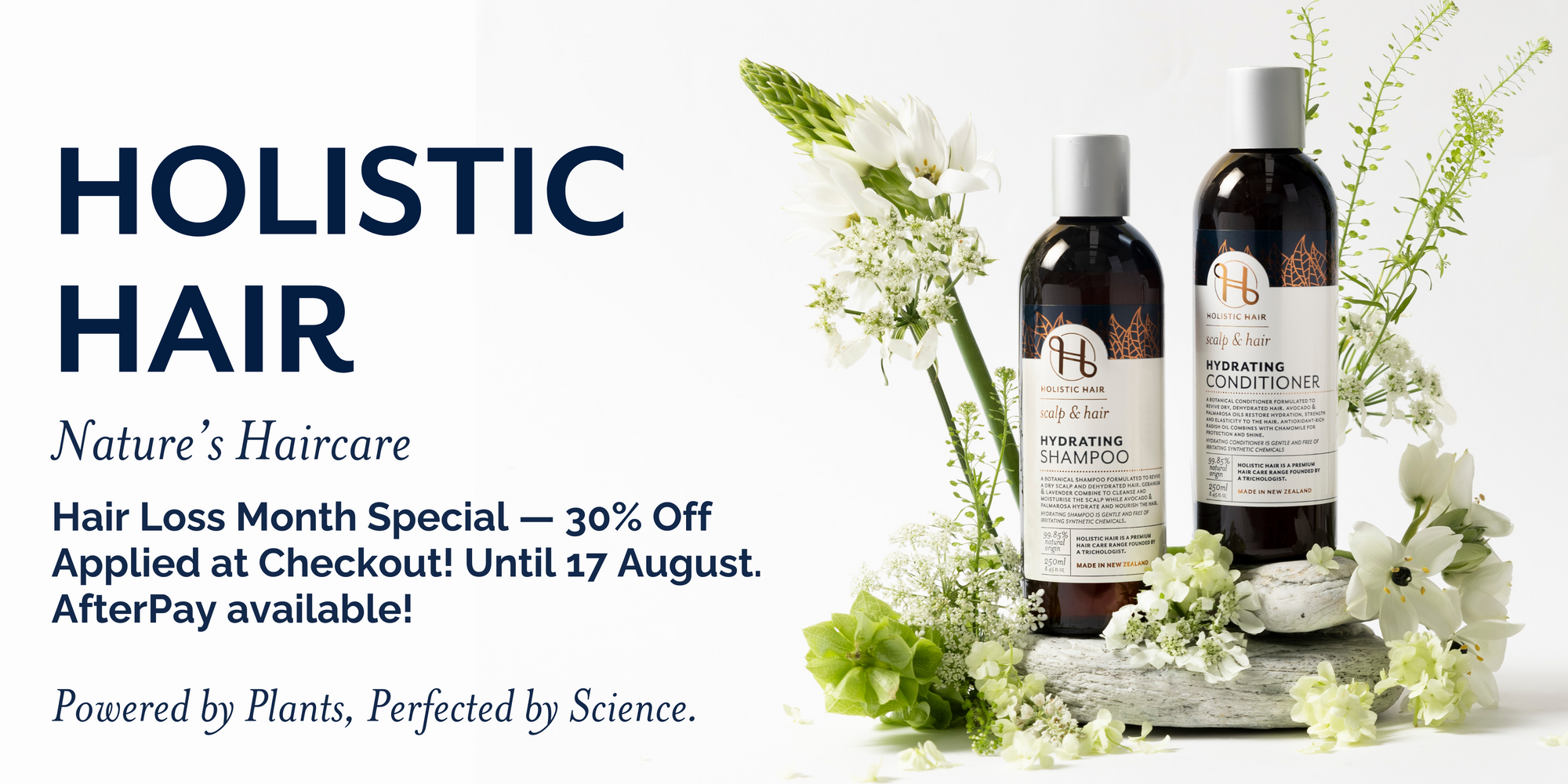 Holistic Hair care products with flowers on a white background