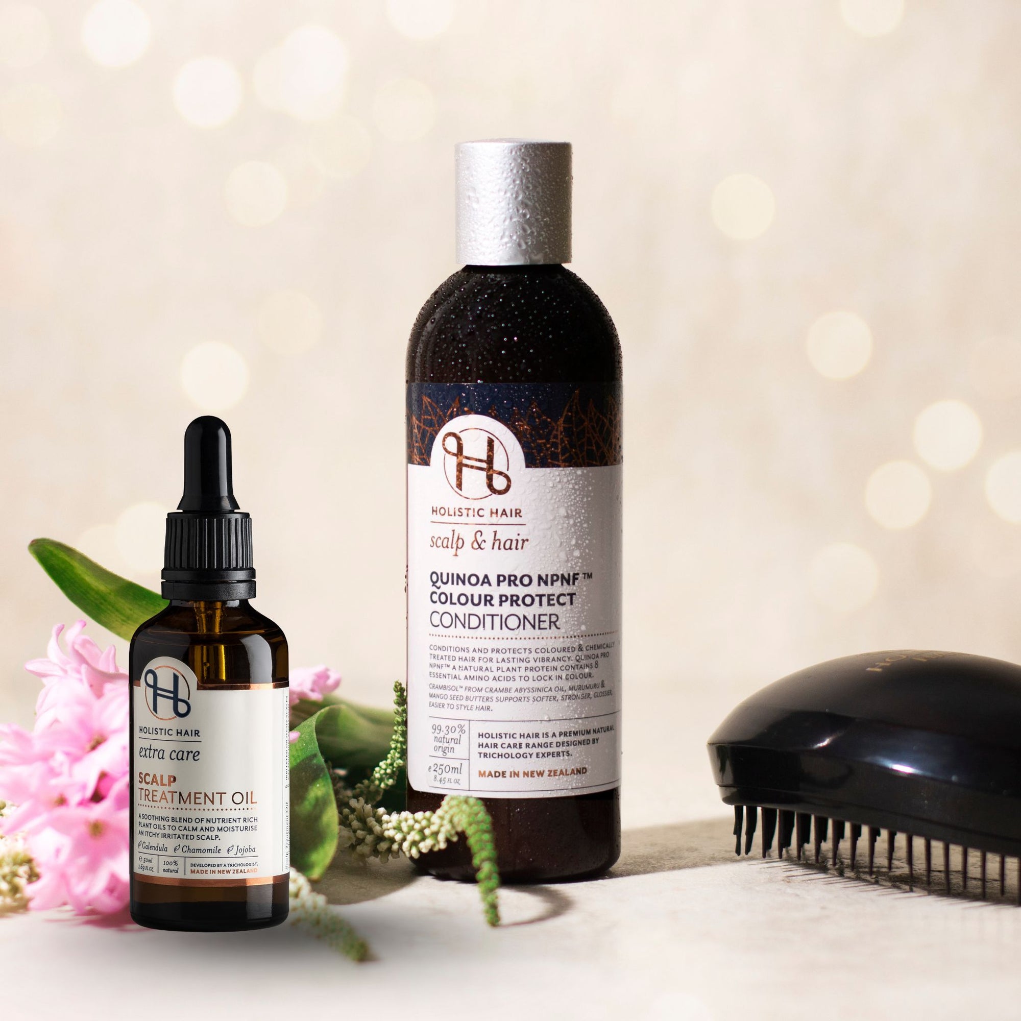 Scalp Treatment Oil 50ml and Quinoa Pro Colour Protect Conditioner 250ml on a transparent background.